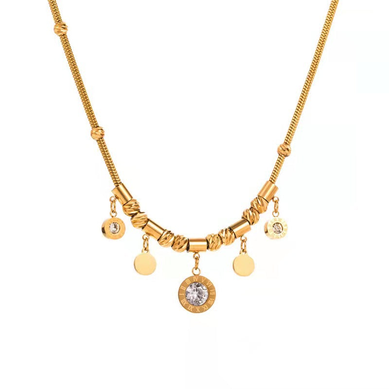 Collar con colgante de piedra romana dorada de 18 quilates de acero titanio al por mayor